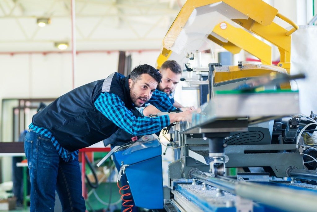 manufacturing workplace with two workers
